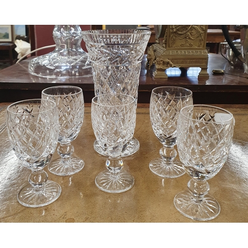 699 - A Waterford Crystal Vase along with a set of five Waterford Crystal Glasses. H 18 cm approx.