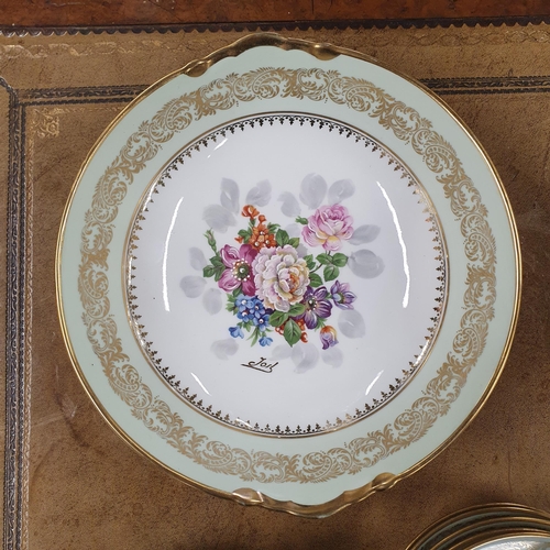 700 - A Fabulous Limoges Rehausse Main Dessert Service consisting of a large serving Bowl along with ten D... 