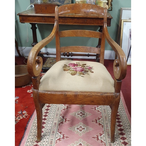 710 - A good 19th Century Elm provincial Armchair/ Carver with tapestry upholstered seat.
BH 88 x W 51 x D... 