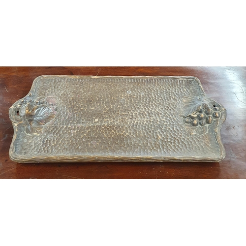 711 - An unusual early 20th Century carved timber Tray depicting bunches of grapes. L 55 x W 27 cm approx.