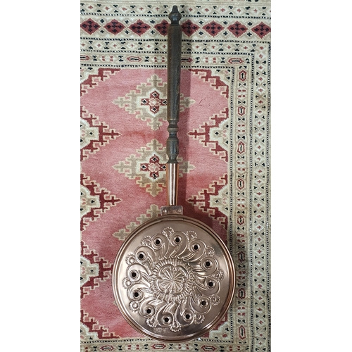 712 - A 19th Century Copper Warming Pan with timber handle. L 76 cm approx.