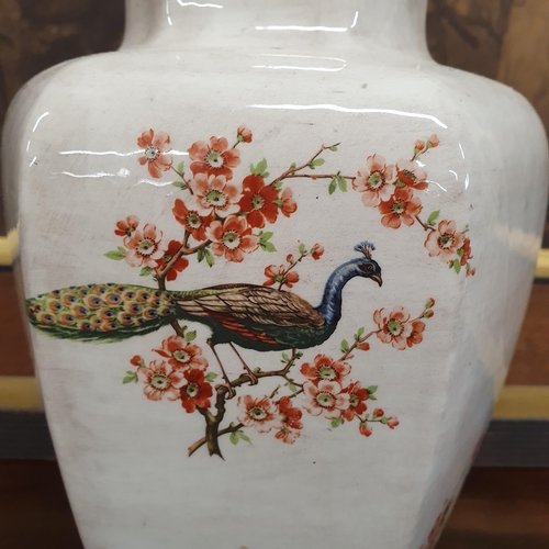 714 - A Ceramic Table Lamp depicting Peacocks.
H 40 cm approx.