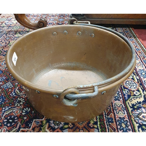 721 - A good 19th Century Copper Jam Pan with cast iron handle. H 18 x D 33 cm approx.