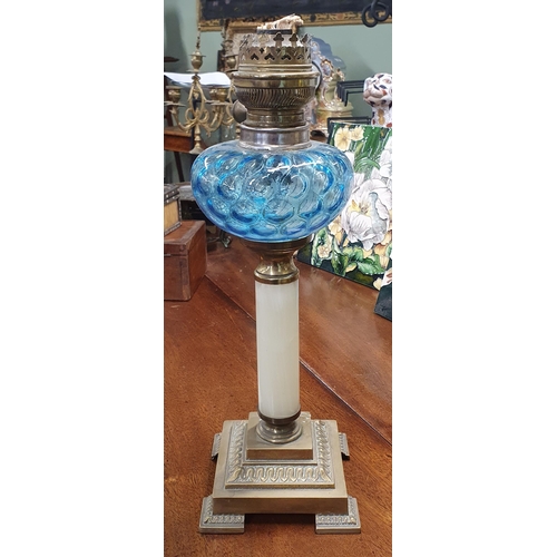 747 - A lovely 19th Century Brass and Glass Oil Lamp with Blue glass Bowl. H 42 cm approx.