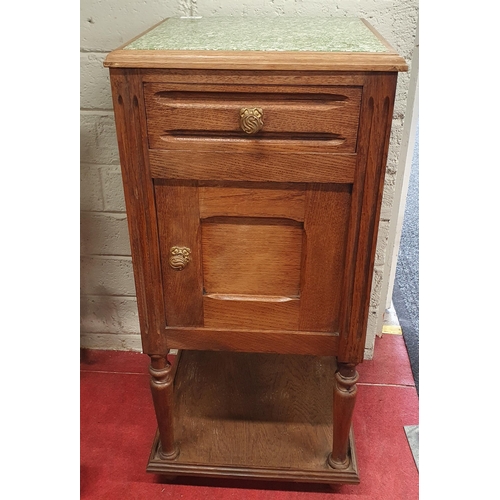 753 - An early 20th Century Oak single drawer Side Cabinet on turned supports with ceramic top.
H 81 x W 4... 