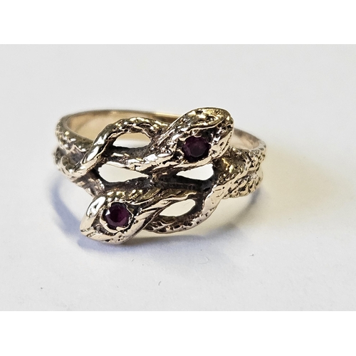 666 - A really good snakes head lovers Ring set with Rubies, total weight 4.6 gms, size T1/2.