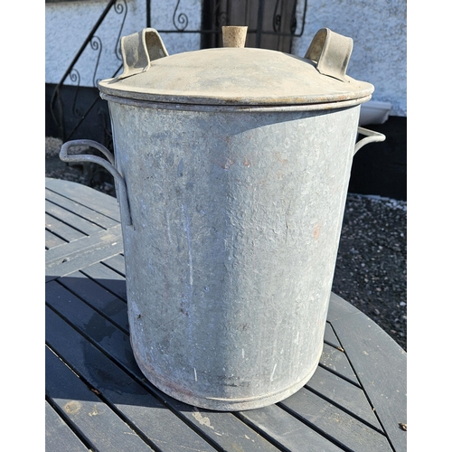 764 - A Galvanised lidded Bin.
H 47 x D 34 cm approx.