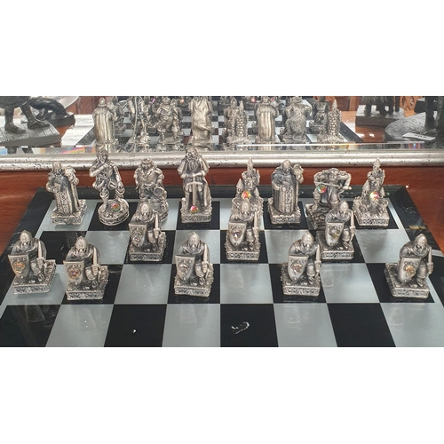 798 - A good metal and stone effect Tudor Mint Chess Set.  40 x 40 cm approx.