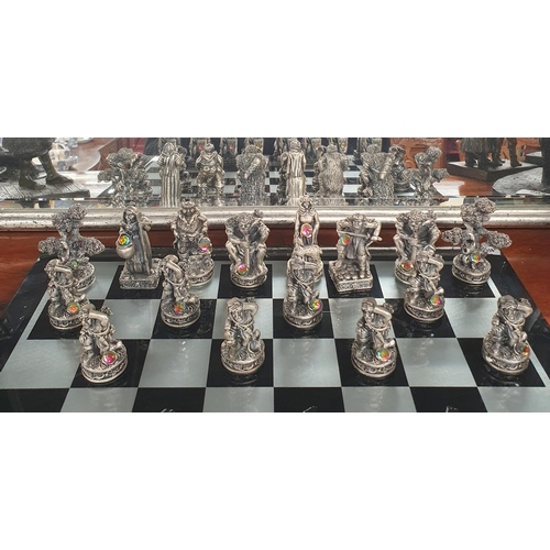 798 - A good metal and stone effect Tudor Mint Chess Set.  40 x 40 cm approx.