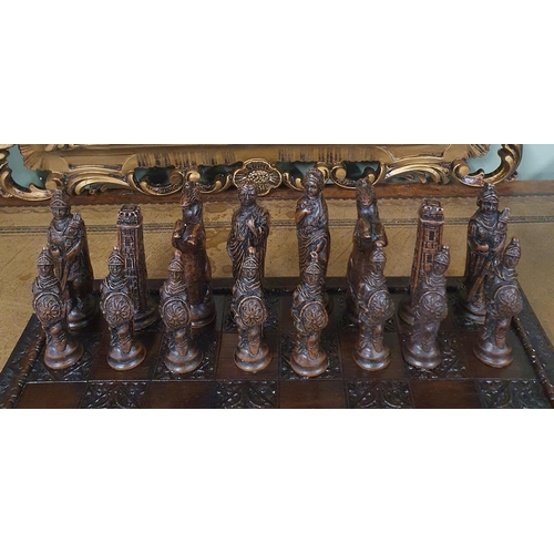 804 - A good stone effect chess Set. 34 x 34 cm approx.