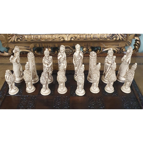 804 - A good stone effect chess Set. 34 x 34 cm approx.