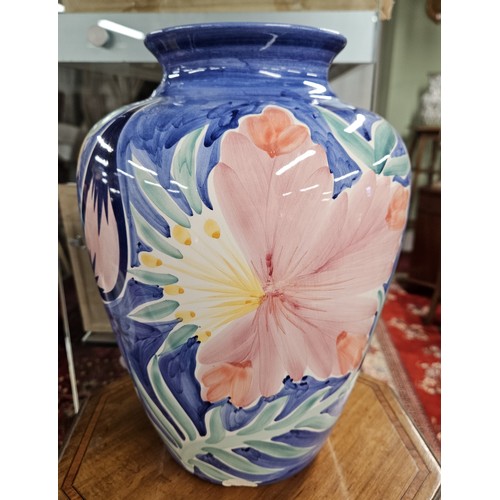 813 - A large hand painted bulbous Vase with floral outline. H 33 cm approx.