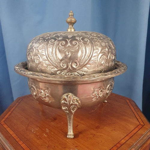 817 - A lovely set of three graduated serving Dishes with embossed lids.  Largest H 21 x D 22 cm approx.