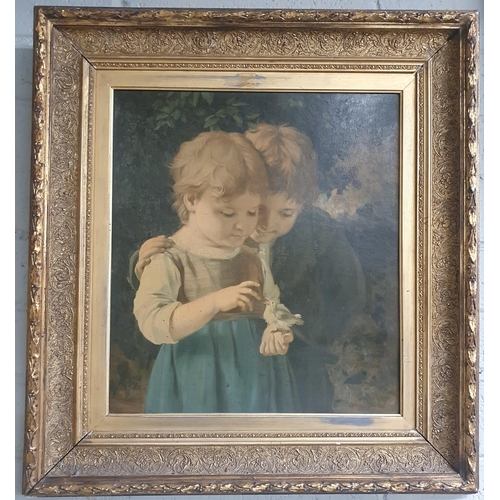 823 - A pair of 19th Century Oleographs of children after original paintings in a fantastic pair of gilt F... 