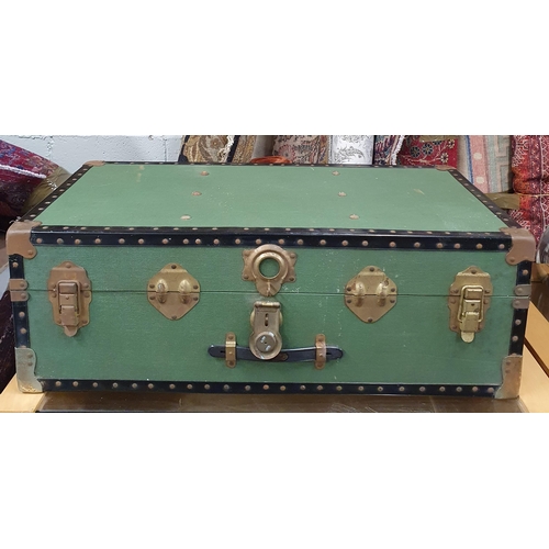 40 - A good 19th Century Leather Suitcase along with a black example and a green shipping trunk.
Largest ... 