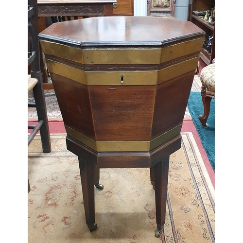 45 - A Superb 19th Century Irish Mahogany Cellerette on stand with brass banding on square tapered suppor... 