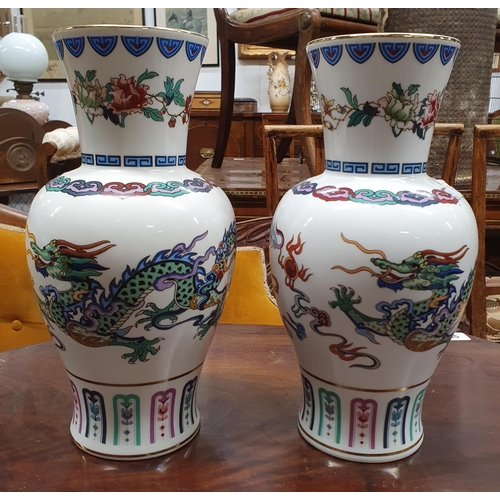 240 - A set of four Oriental Vases.
 H 26 cm approx.