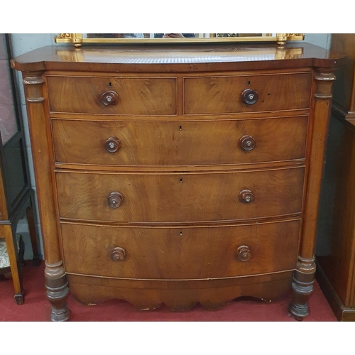 245 - Of good quality. A Georgian Mahogany bow front Chest of Drawers with pillared column corners and tur... 