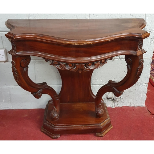 276 - A good Mahogany Console Table of neat proportions with serpentine outline and carved cabriole front ... 