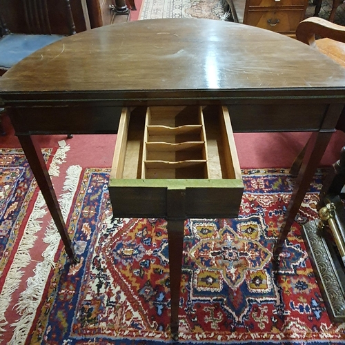 286 - A good late 19th early 20th Century Mahogany half moon Foldover Table with egg and dart moulded edge... 