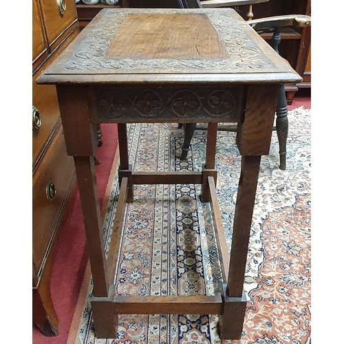 292 - A 19th Century provincial rectangular Oak Side Table with highly carved top and frieze with stretche... 