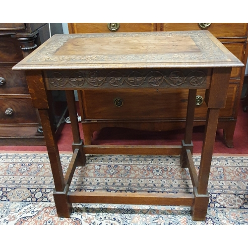 292 - A 19th Century provincial rectangular Oak Side Table with highly carved top and frieze with stretche... 