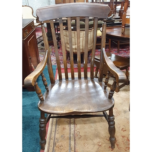 294 - An early 19th Century Elm and Ash Windsor Armchair of large size.
BH 118, SH 49 x 71 x 70 cm approx.