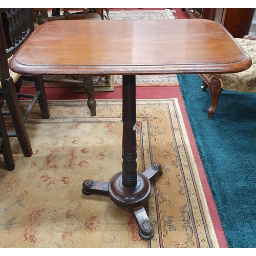 296 - An early 19th Century Mahogany Lamp Table on turned supports and platform base.
H 75 x W 67 x D 44 c... 