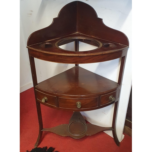 359 - A Georgian Mahogany Corner Washstand with single frieze drawer on stretcher base.
H 100 x W 57 x D 4... 