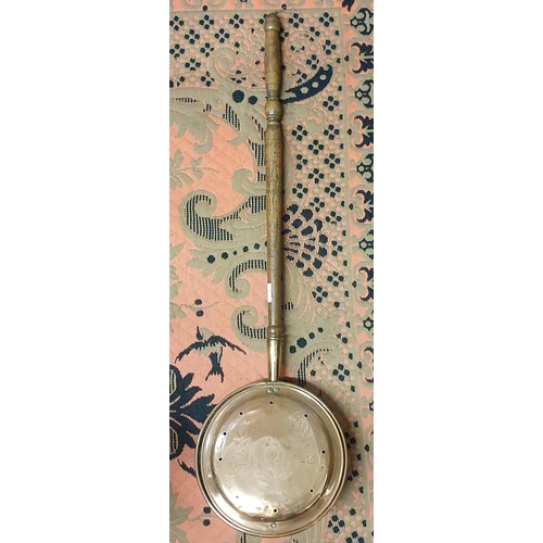 370 - A 19th Century Copper Warming Pan.
L 104 cm approx.