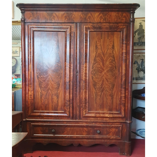 373 - A very large 19th Century Mahogany two door Armoire with single frieze drawer base.
H 205 x W 167 x ... 