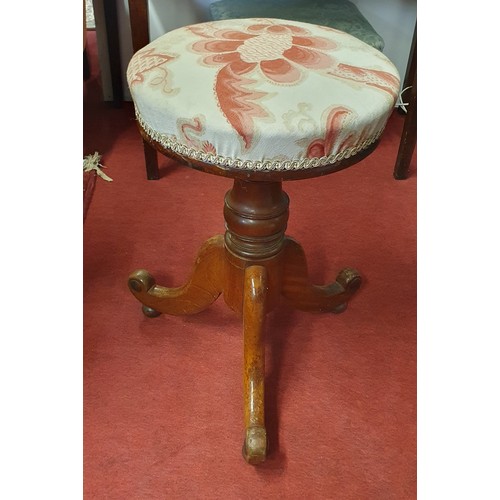 420 - A 19th Century Mahogany rise and fall Piano Stool on tripod supports. D 33 cm approx.