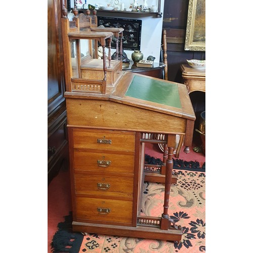 422 - A late 19th Century Walnut Davenport in the Arts and Crafts movement with mirrored gallery back.
W 5... 