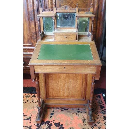 422 - A late 19th Century Walnut Davenport in the Arts and Crafts movement with mirrored gallery back.
W 5... 