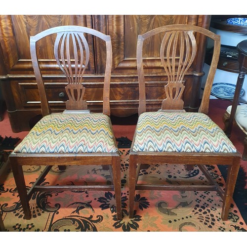 423 - A good pair of early 19th Century Mahogany Dining Chairs with pierced back outline square tapered su... 