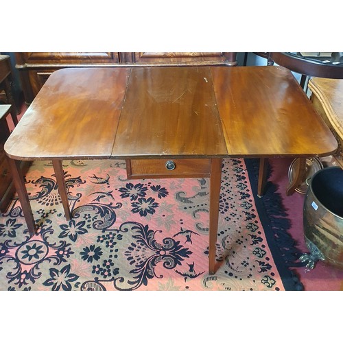 424 - A 19th Century Mahogany Dropleaf Table of neat proportions with single frieze drawer on square taper... 