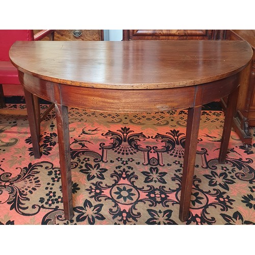 429 - A Georgian Mahogany half moon Table on square tapered supports. D 59.5 x H 73 cm approx.