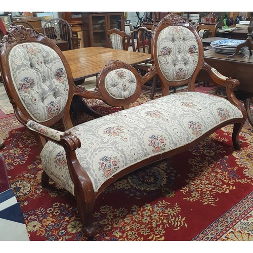 487 - A Mahogany showframe Lovers Seat with tapestry style upholstery and carved cabriole front supports a... 