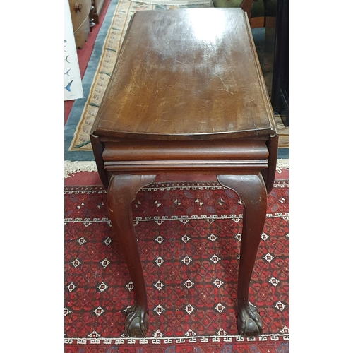 511 - A 19th Century Mahogany Drop Leaf Table with carved cabriole ball and claw supports. 99 x 128.5 x H ... 