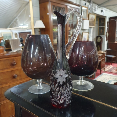 512 - A large quantity of Cranberry and other colour Glass to include a pair of hand painted Goblets.