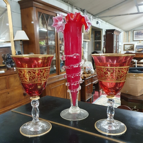 512 - A large quantity of Cranberry and other colour Glass to include a pair of hand painted Goblets.