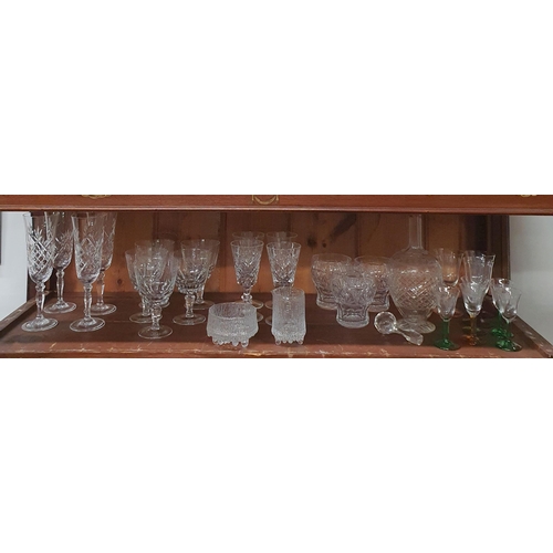 529 - A good quantity of Crystal of various makers on one shelf.