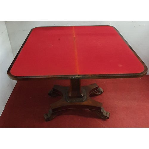 554 - A fantastic Rosewood and Veneered foldover Card Table with canted corner shaft, platform base and ca... 