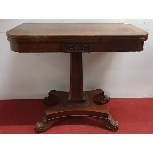 554 - A fantastic Rosewood and Veneered foldover Card Table with canted corner shaft, platform base and ca... 