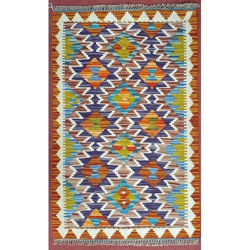 590 - A hand knotted Chobi Runner. 94 x 59 cm approx.