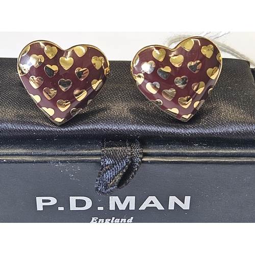 625 - A pair of P D Man Cufflinks.