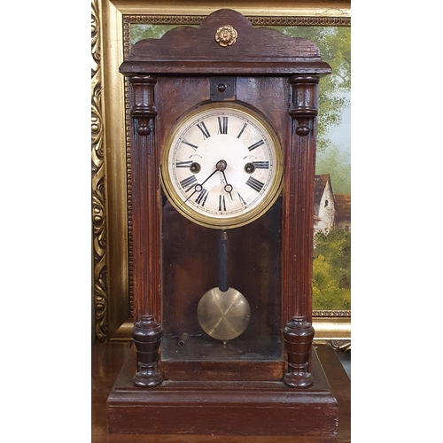 777 - A 20th Century Mantel Clock, along with a twin branch Light and two Amber glasses.