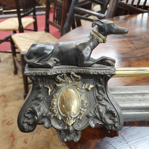 300 - A Fantastic 19th Century Steel and Brass Fender depicting greyhounds sitting on watch.
 L 125 cm app... 