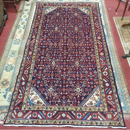 41 - A blue ground Persian carpet .
L 315 x W 160 cm approx.