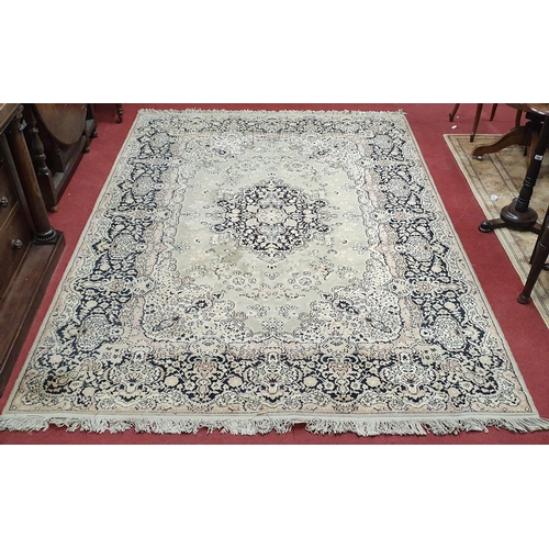 60 - A Green ground Carpet with central medallion design.  300 x 200  cm approx.